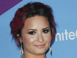 Demi Lovato coughs up blood as she battles...
