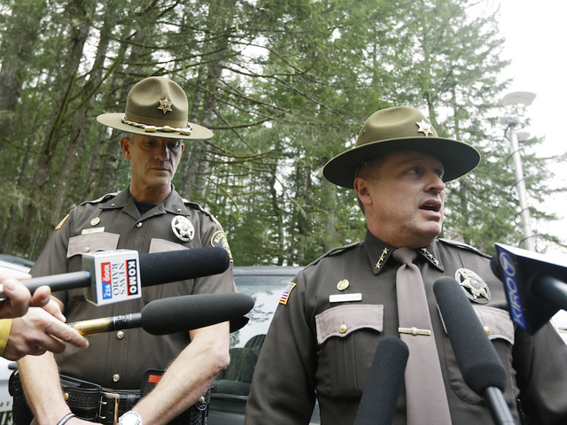 Coroner IDs Washington gunman and 3 of 4 victims