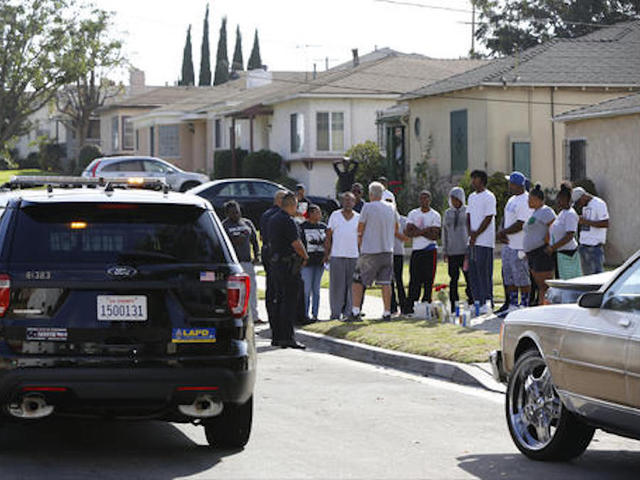 Los Angeles police say shooting victim had loaded handgun