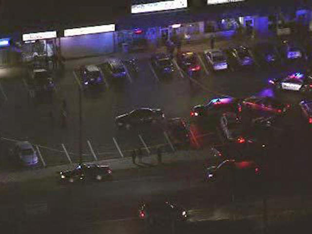 Robber shot, killed by pizza shop customer, police say