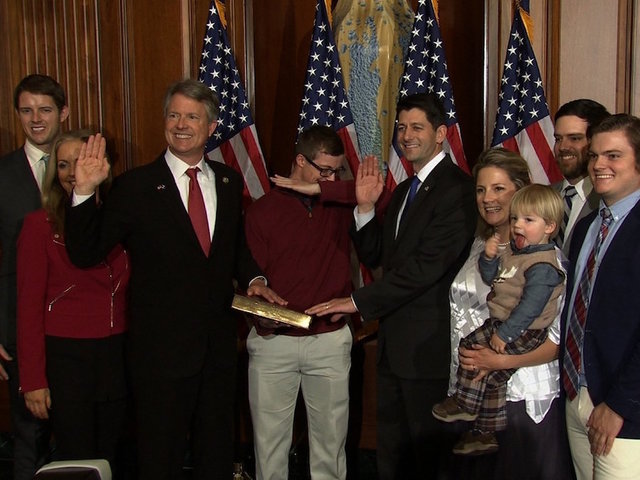 Congressman's son dabs during official swearing-in photo