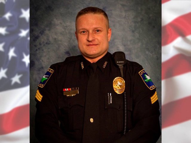 Texas police detective killed in standoff