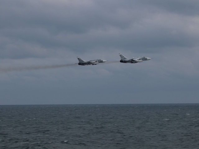 Russian fighter jets 'buzz' US warship in Black Sea, photos show