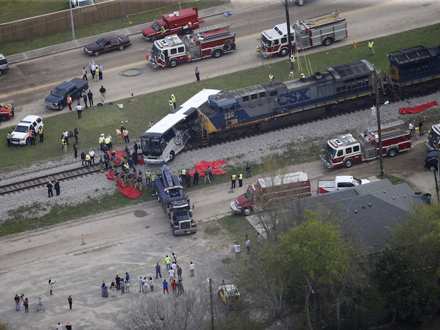 At least 3 dead after train strikes bus in Mississippi