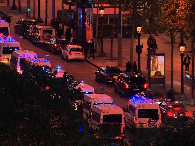 Police officer killed in Champs-Elysees shooting in Paris