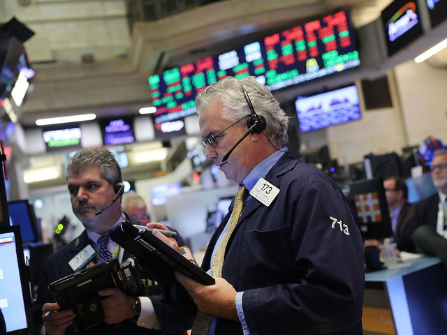 Dow cruises past 23,000 for the first time