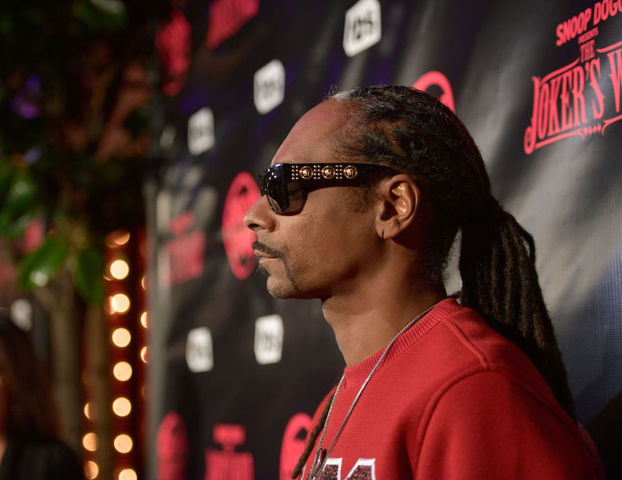 Snoop Dogg stands over body resembling Trump on latest album cover