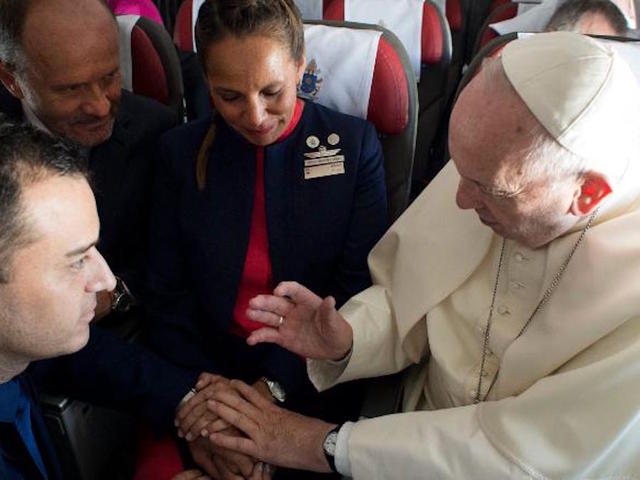 Pope Francis officiates impromptu wedding on papal plane