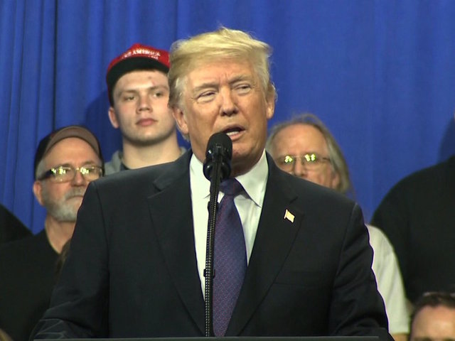 Trump touts economy, tax break as market tanks